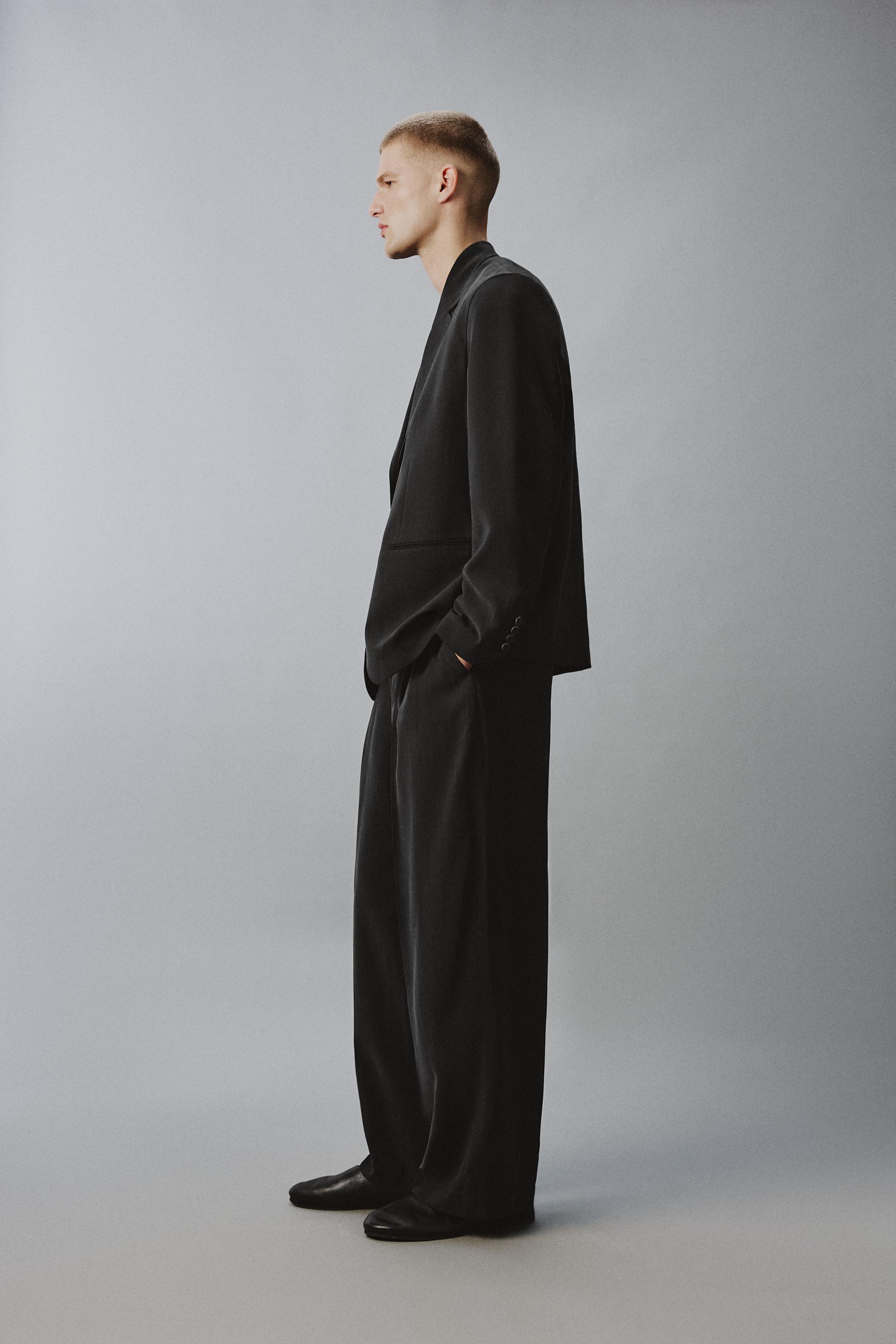 RELAXED FIT FLOWY PANTS